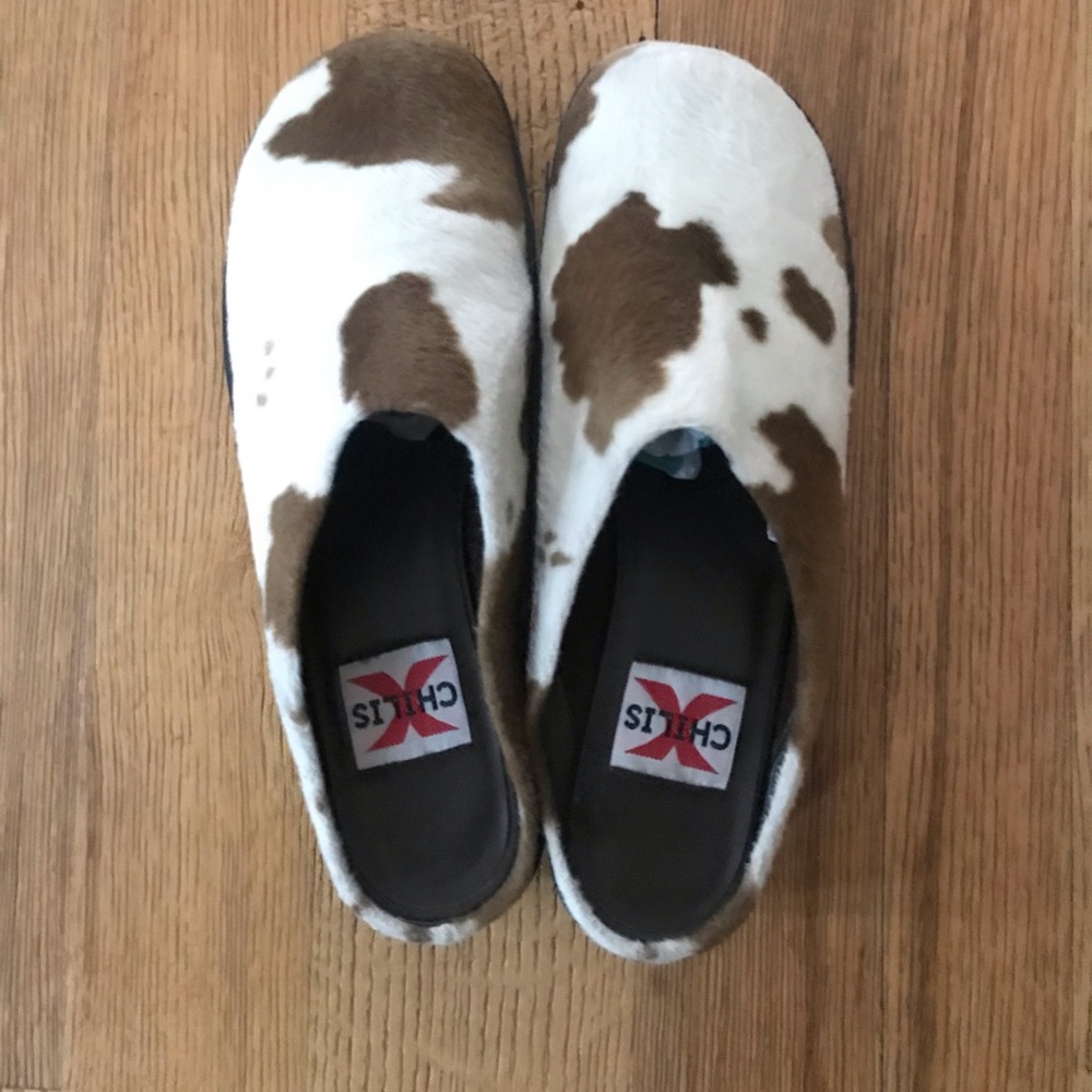 Cow print mules